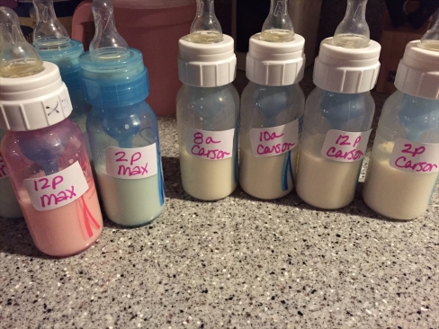 Bottles - color-coded for different ounces and times of day for different baby.